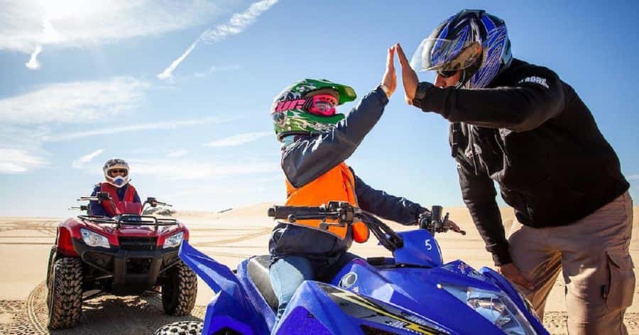 Paradise Valley & Desert Dunes with Camel Ride and quad bike - Quad biking across the Timlaline sand
