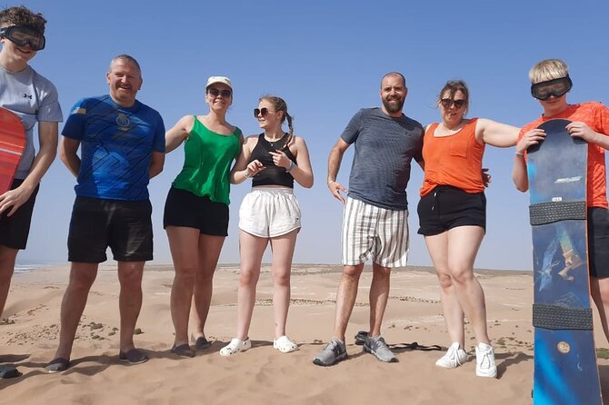 Quad Bike and Sandboarding on Sand Dunes Wild Beach - Timing, group size, and cancellation details