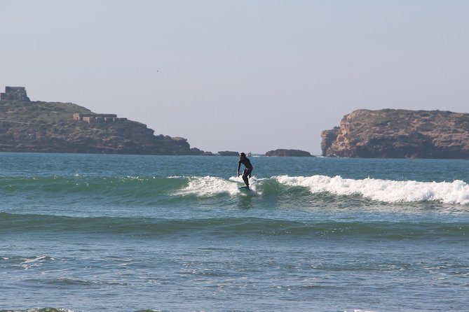 Surf Lesson with local surfer in Essaouira Morocco - Equipment, Showers, and Photos Included