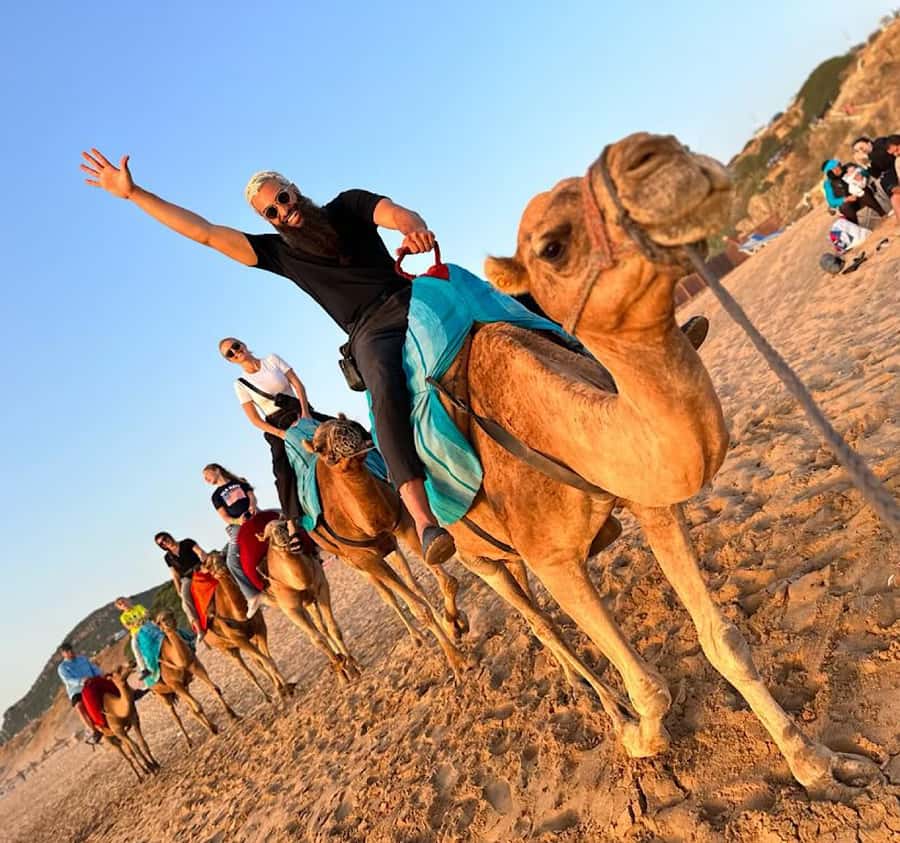 Tangier: Achakar Beach Sunset Camel Ride & Moroccan Dinner - The drive through Tangier’s grand western side