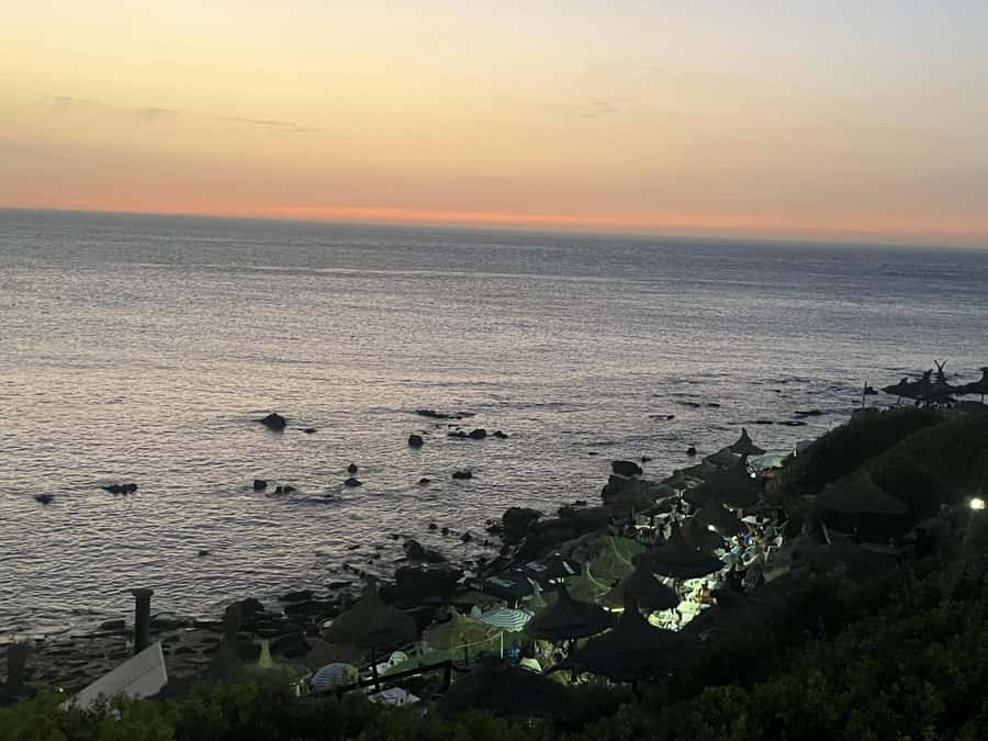 Tangier: Sunset, Tea, Sweets, Camel Ride, and Hercules Caves - Hercules Caves and the sea-facing opening