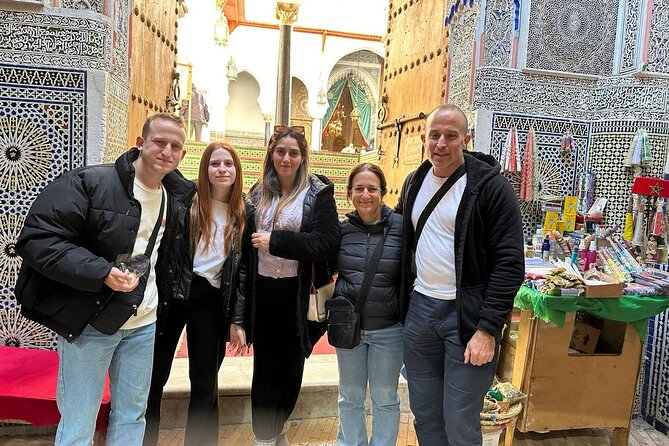 Wonderful Day Tour in Fes: A Historical and Cultural Guided Trip - Bou Inania Medersa: tilework in a compact setting